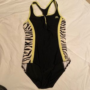 Girls Zero XPosur Swimwear.  1 piece.Black with Zebra stripe insets.  Size14